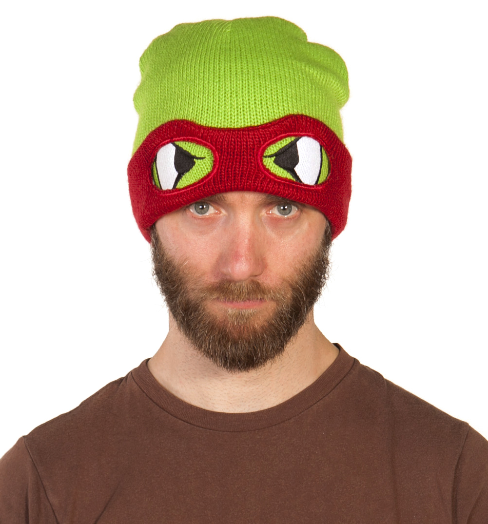 Become a Hero In A Half Shell and your favourite Teenage Mutant Ninja Turtle with an awesome masked beanie hat! This knitted hat features Raphael who wears a red mask. He is known as the bad boy of the team. Hes pretty fierce and angry and is always 