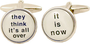 A great set of silver-coloured metal cufflinks with `They think it`s all over` and `It is now` in bl
