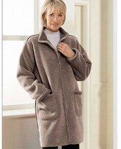 Super warm bonded fleece fabric. Zip front fastening. Two front pockets. Machine washable. Polyester