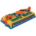 Traditional tin toy. Wind it up and watch the trai