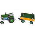 Traditional tin toy. Wind up the tractor and pull
