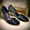 Gorgeous satin evening shoes with flower trim, and peep toe detail. Upper: Textile, Lining, sock and
