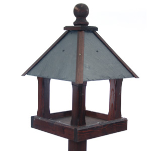 Ensure that the birds are flocking into your garden with this classic bird table. Handcrafted from S