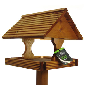 This handsome bird table is sure to attract a wide variety of birds to your garden. Handcrafted to t