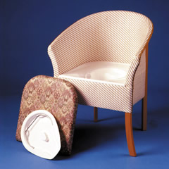 Discreetly concealed commode. Wooden frame chair w