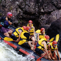 The Tully River offers the most exhilarating white water rafting experience in Australia against a b