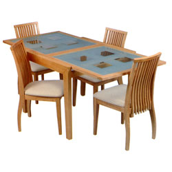 The Turin Dining Table from Ruddiman Furniture Ltd is made from solid beech wood frames with tinted