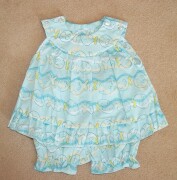 Lovely little sleeveless sundress with matching pants in turquoise blue wit