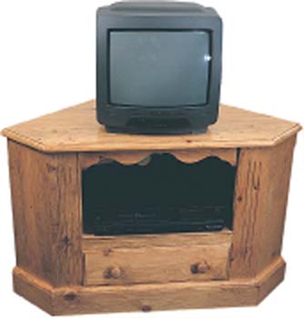 A space saving Pine corner TV and Video unit with one drawer and one fluted alcove