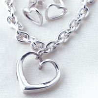 Sterling silver heart and charm bracelet perfect f
