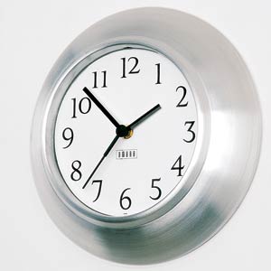 Designed by Henry Huang, for Umbra,  the Fusion Wall Clock has a classic face mounted on a smooth