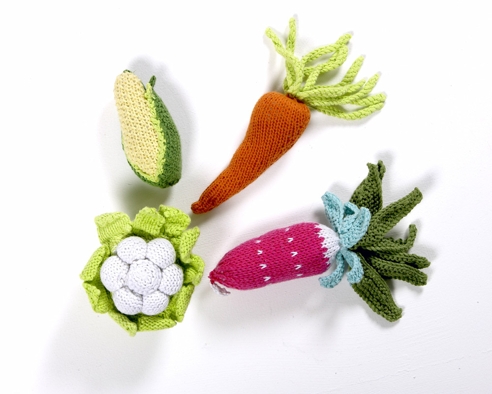 Each of these adorable fabric rattles is shaped like a different vegetable - a carrot, corn on the c