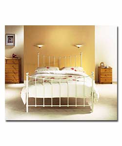Ivory coloured tubular metal frame with 4 round me