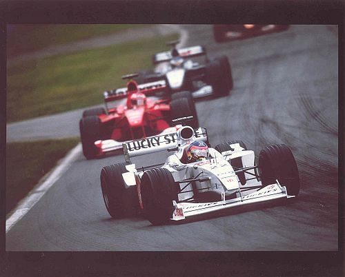 Jacques Villeneuve leading Eddie Irvine and Mika H