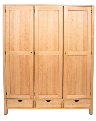 This simple and stylish wardrobe provides ample storage space with the useful addition of drawers