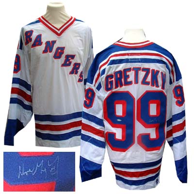 This rare and collectable item of memorabilia is an Official New York Rangers home Jersey personally