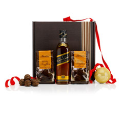 A tipple of Johnnie Walker Black Label Whisky and 2 bags of Dark Chocolate Whisky Truffles.