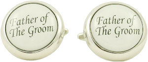A great set of silver-coloured metal cufflinks with the words Father Of The Groom in black on a whit