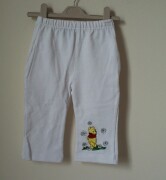 These white bootleg trousers have a lovely embroidered Winnie the Pooh on t