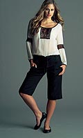 Pretty georgette gypsy style blouse with contrast crochet trim and drawstring hem. Washable