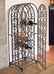 This beautiful hand crafted  wrought iron wine rack has a unique and distinctive quality and style